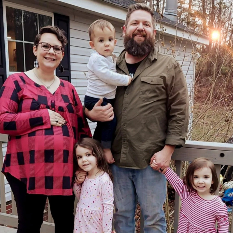 a family posing for a photograph